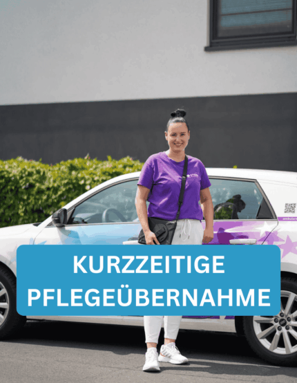 Magda steht vor dem Pflegedienst Stern Auto in Kassel